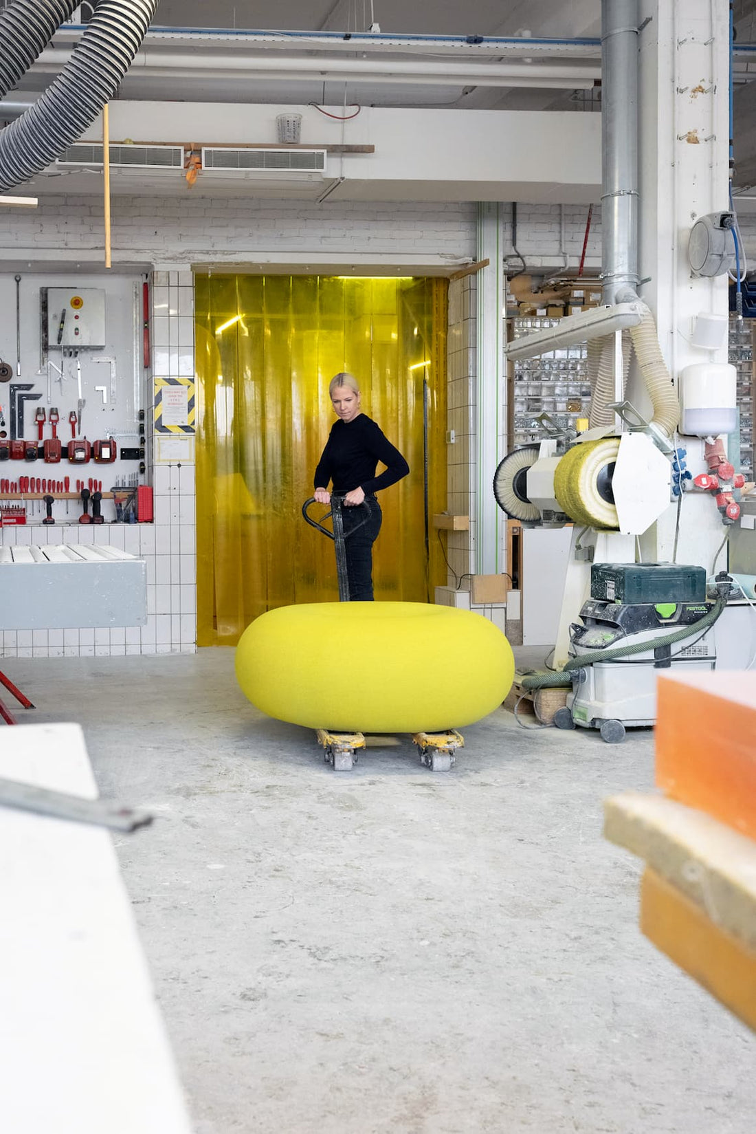 Knitting the Boa Pouf - District Furniture