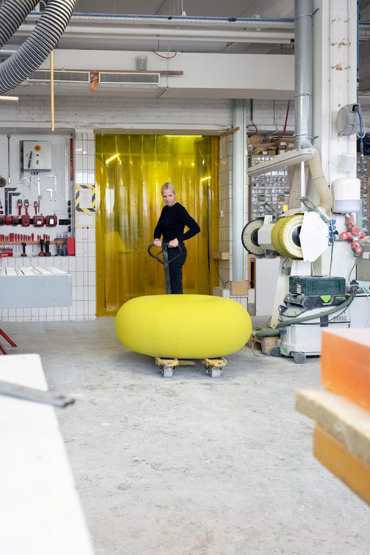 Knitting the Boa Pouf - District Furniture